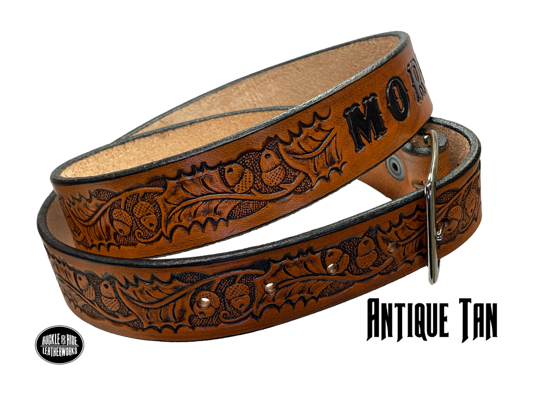 Full grain American vegetable tanned cowhide approx. 1/8"thick. Width 1 1/2" and includes Antique Nickle plated Solid Brass buckle Hand Finished in 3 color options Smooth burnished painted edges Choose with or without name, if without name, design will cover entire length of belt For name Type name desired on belt in "Type Name Here" section, no more than 8 letters maximum Buckle snaps in place for easy changing if desired Made in our Smyrna, TN, USA shop