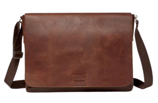 This 2 tone brown leather messenger bag is made from real cowhide leather.&nbsp; Flap is a smooth oil tanned leather with a distressed look and the body has contrasting soft pebbled grain leather. The flap secures with a magnetic snap. Dimensions are approx. 15" by 12" by 3". Back pocket will hold a full size laptop.&nbsp; Inner bag is lined with nylon and leather trim and hardware is brushed nickel. Available for purchase in our retail shop in Smyrna, TN, just outside Nashville.