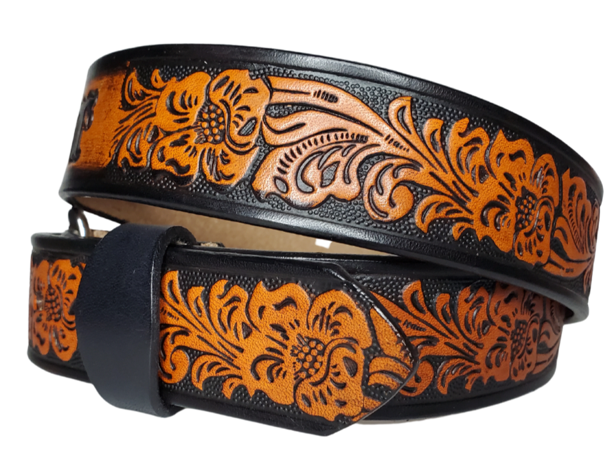  The Prairie Rose is a classic western scroll pattern that's timeless. It's hand finished in a unique Tri Tone Brown that you'll able to wear with most anything. Available in a 1 1/2" width. Full grain American vegetable tanned cowhide approx. 1/8"thick.  Includes Antique Nickle Solid Brass buckle. Smooth burnished painted edges. Choose with or without name if without name. For name Type name desired on belt in section, Buckle snaps in place for easy changing. Made in our Smyrna, TN, USA shop.