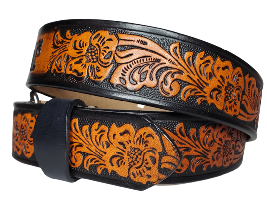  The Prairie Rose is a classic western scroll pattern that's timeless. It's hand finished in a unique Tri Tone Brown that you'll able to wear with most anything. Available in a 1 1/2" width. Full grain American vegetable tanned cowhide approx. 1/8"thick.  Includes Antique Nickle Solid Brass buckle. Smooth burnished painted edges. Choose with or without name if without name. For name Type name desired on belt in section, Buckle snaps in place for easy changing. Made in our Smyrna, TN, USA shop.