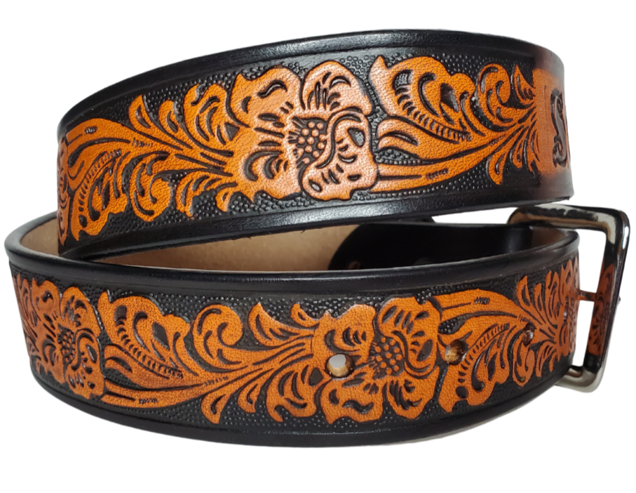  The Prairie Rose is a classic western scroll pattern that's timeless. It's hand finished in a unique Tri Tone Brown that you'll able to wear with most anything. Available in a 1 1/2" width. Full grain American vegetable tanned cowhide approx. 1/8"thick.  Includes Antique Nickle Solid Brass buckle. Smooth burnished painted edges. Choose with or without name if without name. For name Type name desired on belt in section, Buckle snaps in place for easy changing. Made in our Smyrna, TN, USA shop.