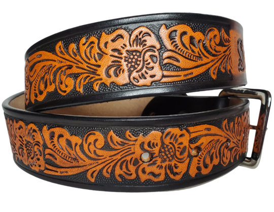  The Prairie Rose is a classic western scroll pattern that's timeless. It's hand finished in a unique Tri Tone Brown that you'll able to wear with most anything. Available in a 1 1/2" width. Full grain American vegetable tanned cowhide approx. 1/8"thick.  Includes Antique Nickle Solid Brass buckle. Smooth burnished painted edges. Choose with or without name if without name. For name Type name desired on belt in section, Buckle snaps in place for easy changing. Made in our Smyrna, TN, USA shop.