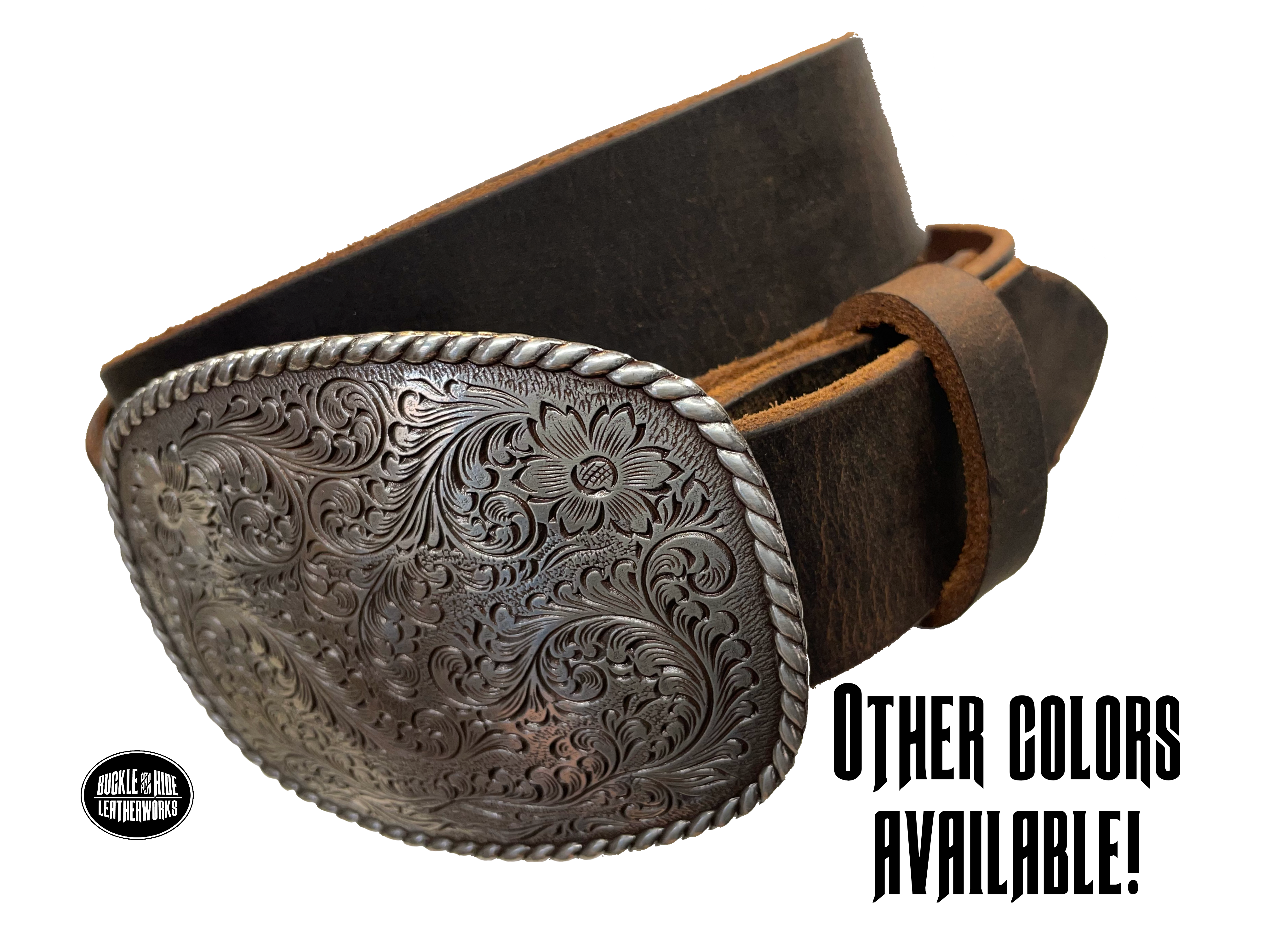 This rectangular shaped buckle has rounded edges with rope design around the border. It is chrome colored with scroll design etched appearance on surface.  Measures 2 3/4" tall by 3 3/4" wide and fits belts up to 1 1/2" wide. Buckle is made in Taiwan. Belt is a single strip of leather that is 1 1/2" wide and available in sizes 34" to 44". Colors are distressed brown, black, and dark brown. Available online and in our shop in Smyrna, TN, just outside Nashville.