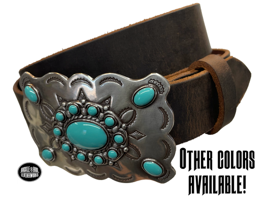 Southwestern style belt buckle with Southwestern tooling, scalloped design around edges, and simulated turquoise stones, approx. size 3 1/2" wide by 2 1/2" tall.  Color is antique silver, buckle is made of zinc. Fits belts 1 1/2" wide. Belt is handmade from a single strip of leather, choose from either distressed brown, black, or dark brown. CHOOSE ONE BELT STRIP COLOR! Available online and in our shop just outside Nashville in Smyrna, TN. Main photo.