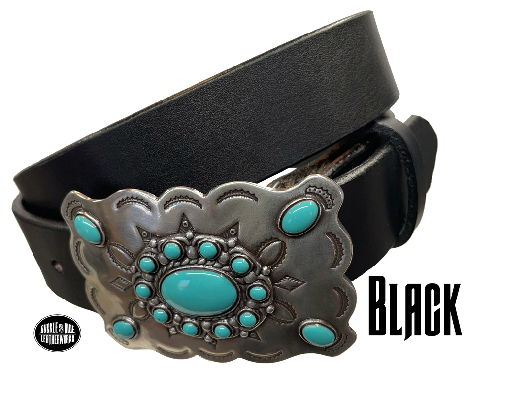 Southwestern style belt buckle with Southwestern tooling, scalloped design around edges, and simulated turquoise stones, approx. size 3 1/2" wide by 2 1/2" tall.  Color is antique silver, buckle is made of zinc. Fits belts 1 1/2" wide. Belt is handmade from a single strip of leather, choose from either distressed brown, black, or dark brown. CHOOSE ONE BELT STRIP COLOR! Available online and in our shop just outside Nashville in Smyrna, TN. Black belt.