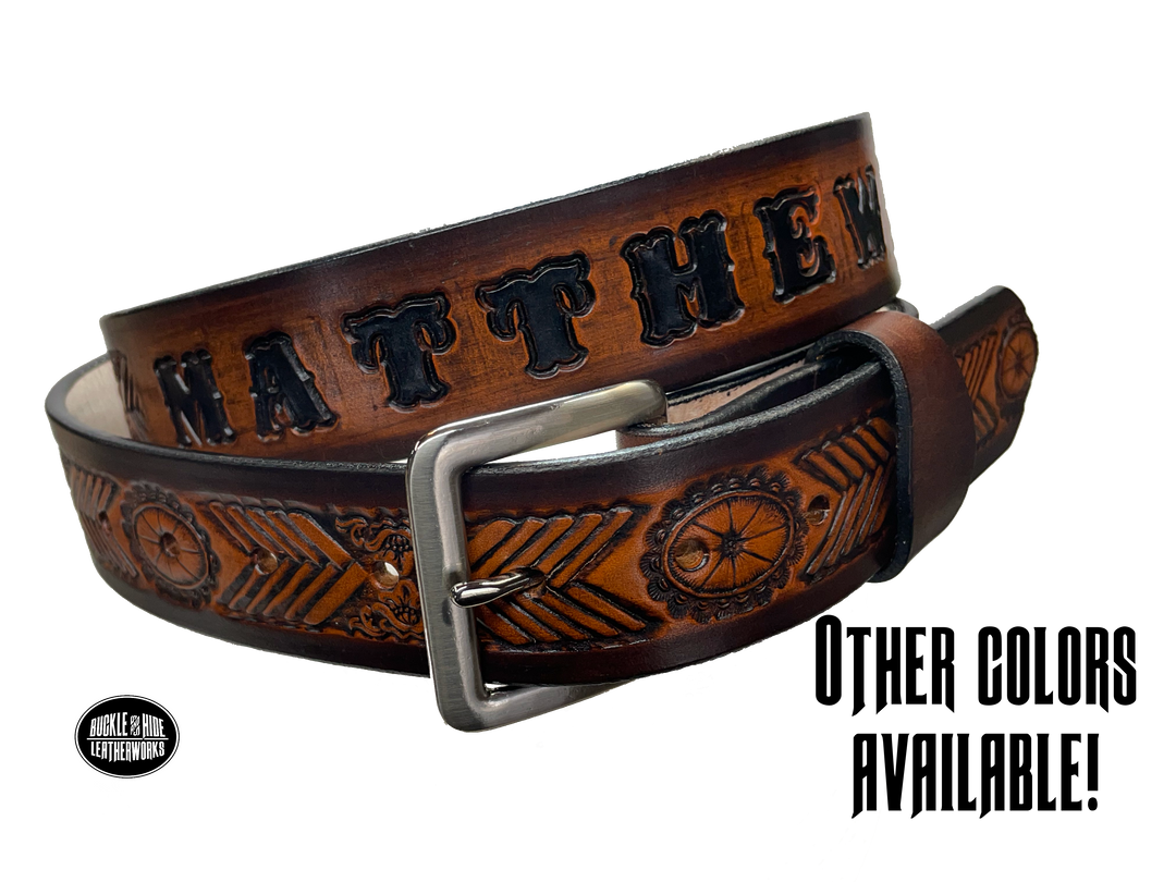 This unique belt features a chevron shape that replicates a hand-laced look, plus an oval concho. Snap-on buckle made from veg tan cowhide in your choice of finish or with a name. Crafted with care in Tennessee, just a hop, skip, and a jump away from Nashville.