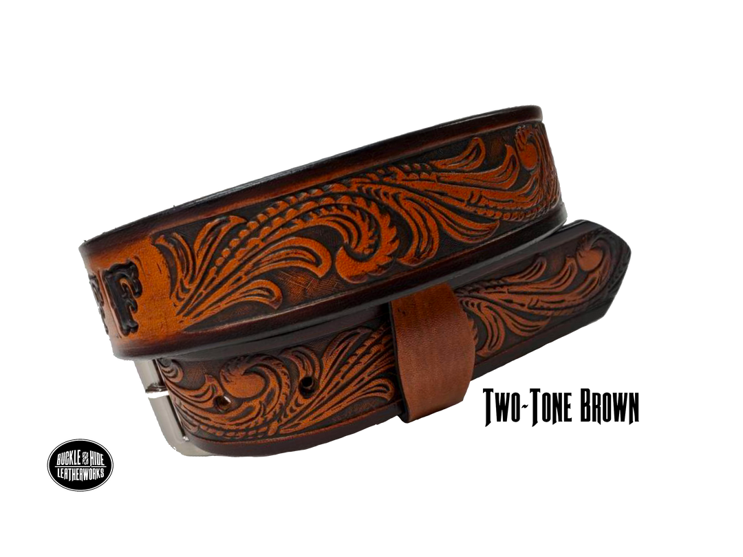 Full grain American vegetable tanned cowhide approx. 1/8"thick. Width 1 1/2" and includes Antique Nickle plated Solid Brass buckle Hand Finished in 3 color options Smooth burnished painted edges Choose with or without name, if without name, design will cover entire length of belt For name Type name desired on belt in "Type Name Here" section, no more than 8 letters maximum Buckle snaps in place for easy changing if desired Made in our Smyrna, TN, USA shop