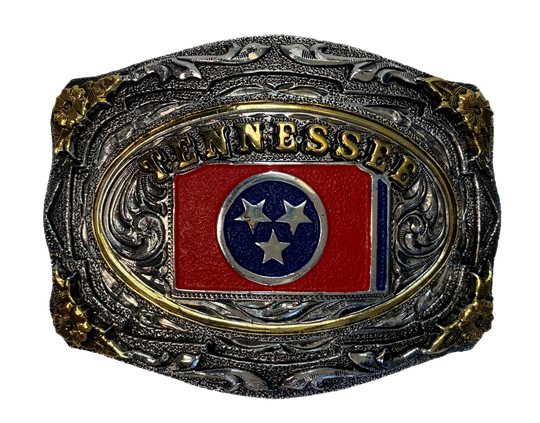 Scroll design belt buckle with beaded edge Tennessee Flag affixed to center Heavy duty Dimensions 2 3/4" tall by 4" wide Fits belts up to 1 3/4" width Sold online and in our shop in Smyrna, TN, just outside of Nashville.