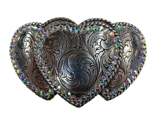 Popular Nocona Three Hearts Buckle in Blazin Roxx collection Dimensions are 1 1/2" tall by 4 1/4" wide Engraved scroll design on hearts with edges lined in rhinestones Sold online and in our shop in Smyrna, TN, just outside of Nashville.