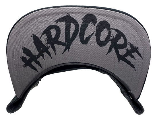 Black Flat Bill Cap with Gray mesh back. Front has a Silver embroidered Brass Knuckles patch. "HARDCORE" design also under the bill. Structured top to keep its shape. Sold at our shop just outside Nashville in Smyrna, TN.