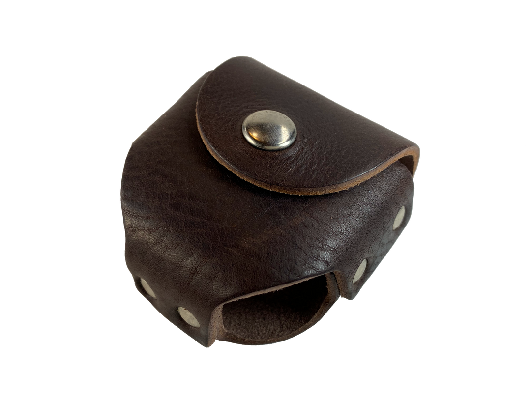 Made in USA Leather case to hold a can of snuff. Attaches to your belt. Snap closure. Available in Brown. Available online and in our retail shop in Smyrna, TN. 