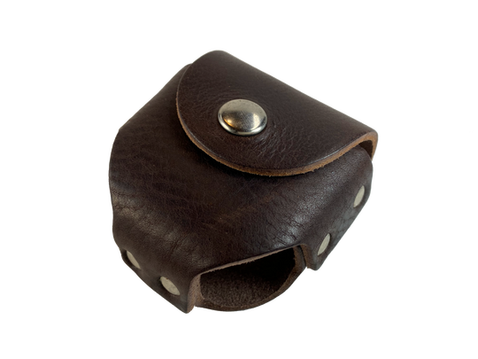 Made in USA Leather case to hold a can of snuff. Attaches to your belt. Snap closure. Available in Brown. Available online and in our retail shop in Smyrna, TN. 