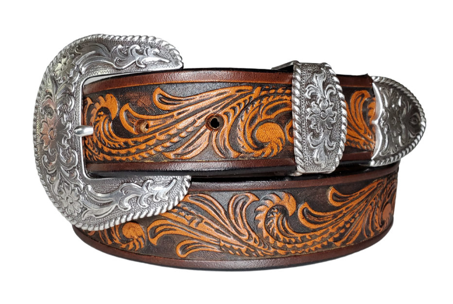 The "Rustler" design is one of our best sellers. But we've added a Classic Western 3 piece buckle set in Antique Nickel that looks great on plain 1 1/2" Black or Brown belt. An easy to wear shape that's not too big, measures approx. 3 7/8" wide by 2 1/2" tall. Belt is made from a single strip of leather in our shop in Smyrna, TN. Buckle is Imported. Available in our shop just outside Nashville in Smyrna, TN as well as online.