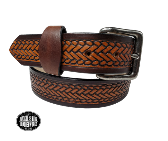 The West End handmade all leather belt is made from a single strip of Veg-Tan cowhide that is a hand finished Veg-tan that is 9-10 oz., or approx. 1/8" thick.  width  1 1/2".  It has an embossed design that is never out of style!  The antique nickel plated solid brass buckle is snapped in place. This belt is made just outside Nashville in Smyrna, TN. Perfect for casual and dress wear, it can be for personal use or for groomsman gifts or other gifts as well. 