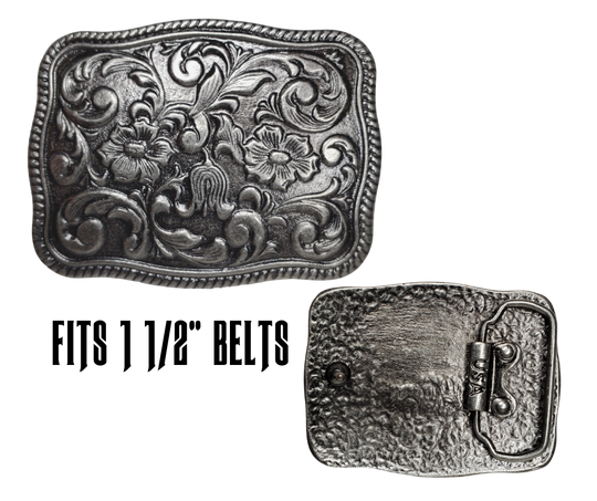 This stylish Western Scroll Belt Buckle is the perfect accessory. Featuring an elegant antique silver western floral pattern, this buckle is sure to elevate any outfit. This belt buckle that may be attached to your belt.  It has a oval shape that Fits 1 1/2" belts, Size approx. 3-1/2" x 2-3/4. Available in our shop just outside Nashville in Smyrna, TN.