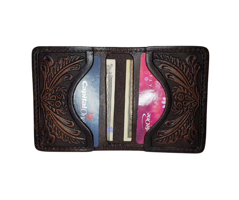 A folded Front Pocket Wallet with a Classic Western Scroll pattern Embossed on the outside and inside pockets with a unique hand stained appearance. Features 2 Credit card slots and 2 Folded cash pockets underneath. Great for the minimalist attitude at a folded 3"x 4" size. Available online and in our retail shop in Smyrna, TN, just outside of Nashville. Imported