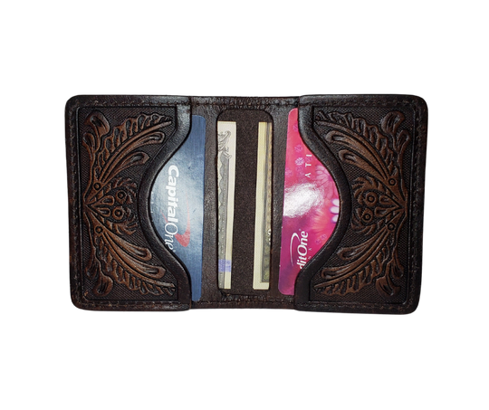 A folded Front Pocket Wallet with a Classic Western Scroll pattern Embossed on the outside and inside pockets with a unique hand stained appearance. Features 2 Credit card slots and 2 Folded cash pockets underneath. Great for the minimalist attitude at a folded 3"x 4" size. Available online and in our retail shop in Smyrna, TN, just outside of Nashville. Imported