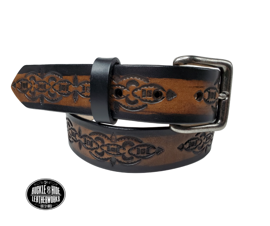 The Williamson handmade all leather belt is made from a single strip of Veg-Tan cowhide that is a hand finished Veg-tan that is 9-10 oz., or approx. 1/8" thick and is 1 1/2" thick. It has an Vintage style embossed design that is never out of style!  The antique nickel plated solid brass buckle is snapped in place. This belt is made just outside Nashville in Smyrna, TN. Perfect for casual and dress wear, it can be for personal use or for groomsman gifts or other gifts as well. 