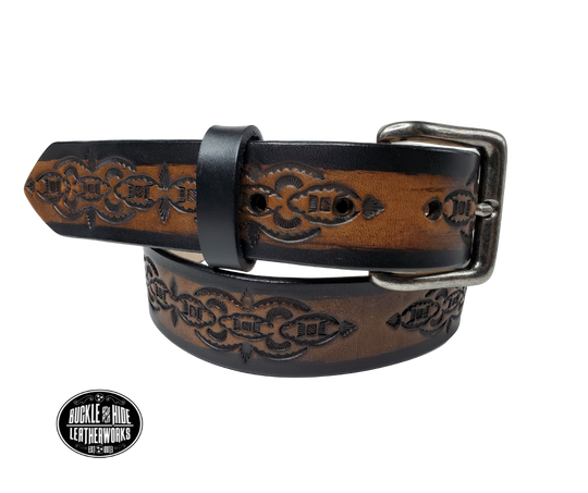 The Williamson handmade all leather belt is made from a single strip of Veg-Tan cowhide that is a hand finished Veg-tan that is 9-10 oz., or approx. 1/8" thick and is 1 1/2" thick. It has an Vintage style embossed design that is never out of style!  The antique nickel plated solid brass buckle is snapped in place. This belt is made just outside Nashville in Smyrna, TN. Perfect for casual and dress wear, it can be for personal use or for groomsman gifts or other gifts as well. 