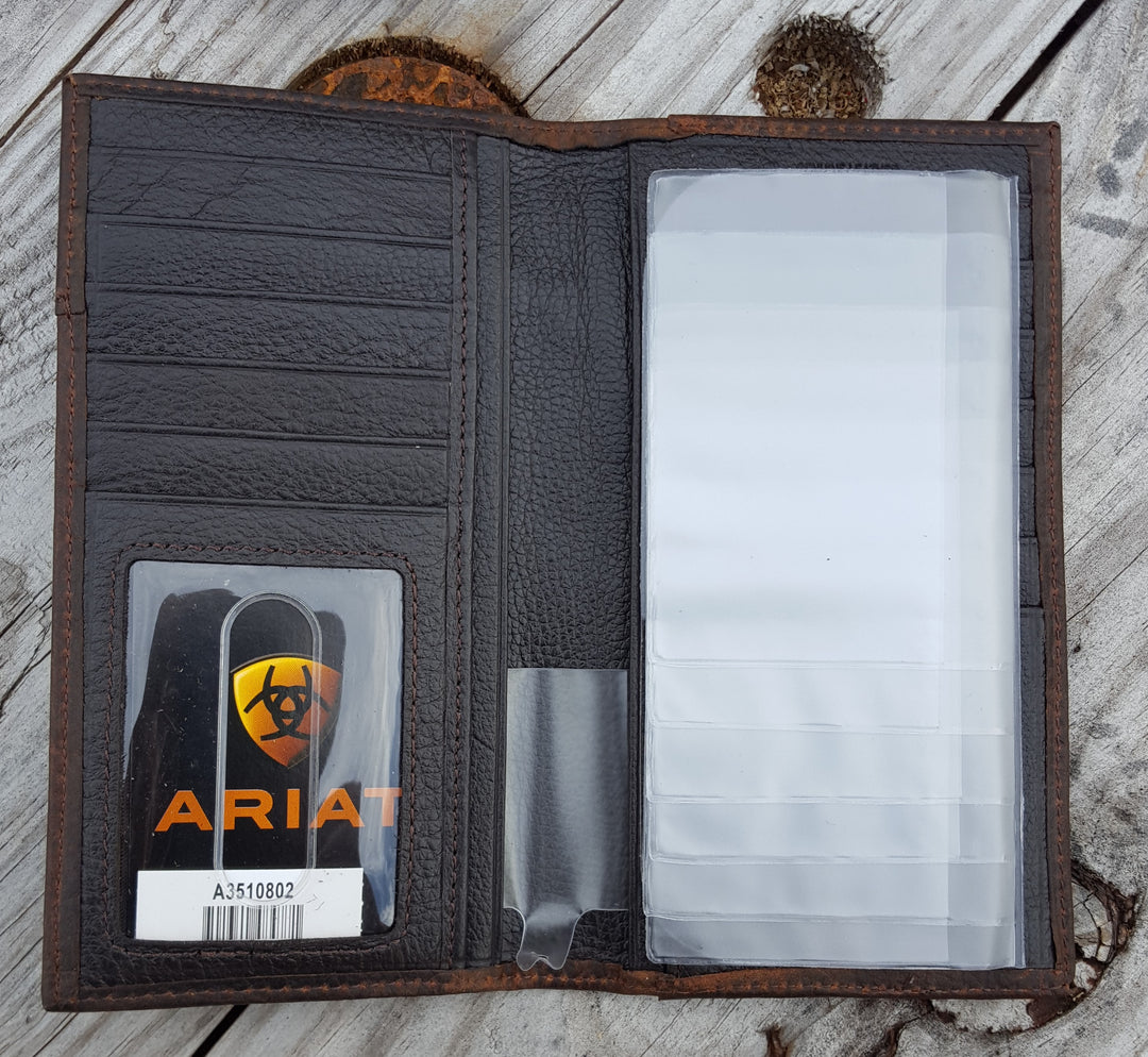 Multiple credit card slots, clear driver's license slot and removable picture holder.
Folded wallet measures 7" tall by 3" wide
Interior has twelve card slots, one open cash pocket, and an identification window plus removable clear plastic picture holder.