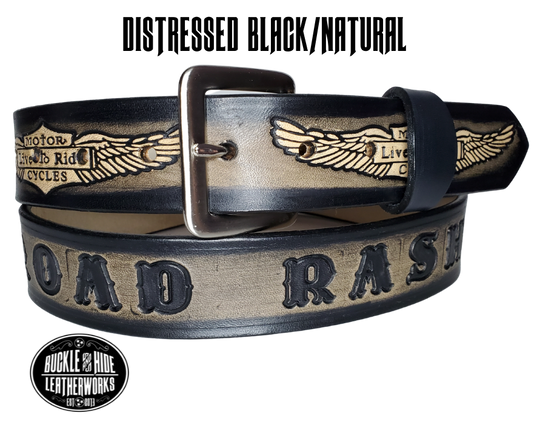 "The SGT AT Arms" is a handmade real leather belt made from a single strip of cowhide shoulder leather that is 8-10 oz. or approx. 1/8" thick. It has hand burnished (smoothed) edges and the Classic Wings and Shield pattern down the center. This belt is completely HAND dyed with a multi step finishing technic. The antique nickel plated solid brass buckle is snapped in place with heavy snaps.  This belt is made just outside Nashville in Smyrna, TN.