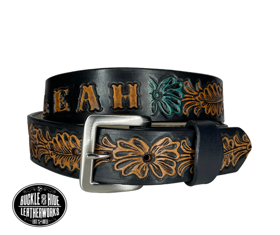 "The Desperado" is a handmade real leather belt made from a single strip of cowhide shoulder leather that is 8-10 oz. or approx. 1/8" thick. It has hand burnished (smoothed) edges and the Classic Western pattern. This belt is completely HAND dyed with a multi step finishing/painting technic. The antique nickel plated solid brass buckle is snapped in place with heavy snaps.  This belt is made just outside Nashville in Smyrna, TN.