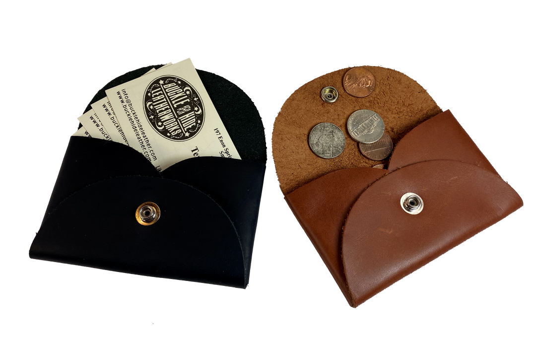 Handmade leather coin wallet with silver colored snap closure  so that coins and other small items may be carried.  Fits in the palm of the hand. BUY MORE and SAVE!  Available in either assorted brown or black leather.  Made in USA